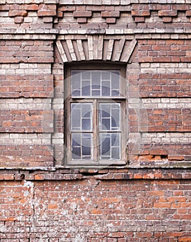 Old brick wall with a window. architecture, details.