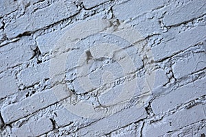 Old brickwork. Brick wall. White silicate brick. Crumbling brick from time to time