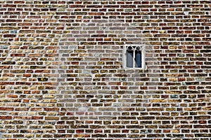 Old brickwork and window in Brugge, Flanders, Belgium