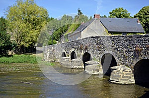 Old bridge at AsniÃ¨res sur ViÃ¨gre in France
