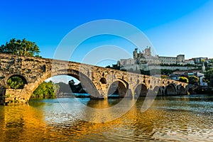 Old bridge and the cathedral on the Orb river in BÃ©ziers in the HÃ©rault in Occitanie, France