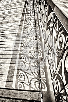 Old bridge with decorated handrail