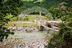 Old bridge in Dragobi over river Lumi i Valbones National Park Valbona in Albania, Europe