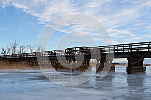 Old Bridge Over a Frozen River