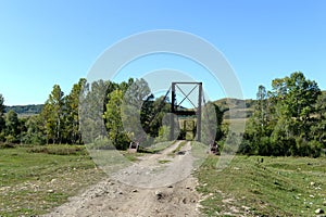 The old bridge over the Inu river near the village of Chineta in the Altai Territory