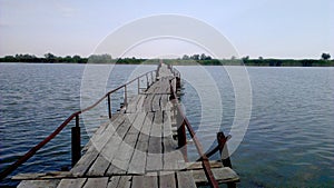 Old bridge over the lake