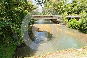 Old bridge over mountain river