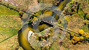 Old Bridge Over Nida River Bend in Swietokrzyskie,Poland. Aerial Drone View