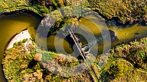 Old Bridge Over Nida River Bend in Swietokrzyskie,Poland. Aerial Drone View