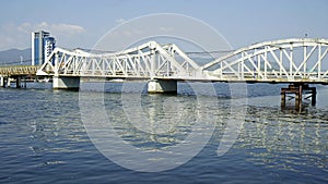 old bridge over river in kampot