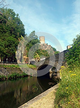Old bridge over river Sauer near village Esch-sur-Sure in the Ardennes of Luxembourg