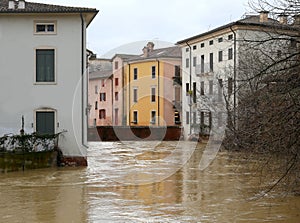 old Bridge and river called FIUME RETRONE in Vicenza City in Italy during flood