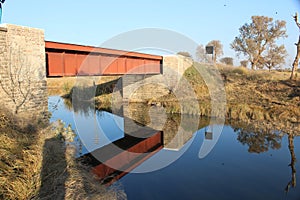 Old bridge and it`s shadow of colonial time