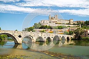 Old bridge and Saint Nazaire cathedral on the Orb river in Beziers