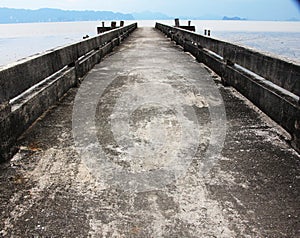 Old bridge sea landscape meeting point