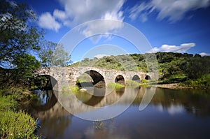 Old Bridge in Torrejon El Rubio in Caceres. photo