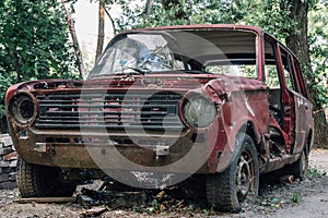 Old broken abandoned rusty retro car