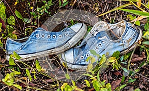 Old, Broken Abandoned Snickers Shoes