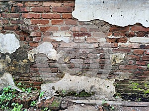 Old broken brick wall background
