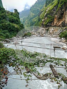 Old broken bridge over Marsyangdi river near Dharapani - Nepal