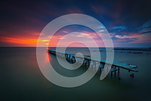 Old broken bridge in the sea, long exposure