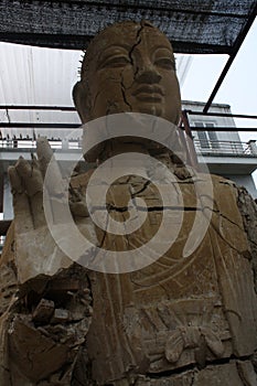 An Old Broken Buddha Statue