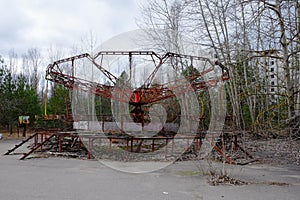 An old broken carousel in the abandoned city of Pripyat. Abandoned amusement park