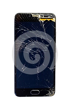 Old broken cell phone with broken screen