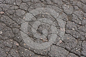 Old broken cracked asphalt texture background