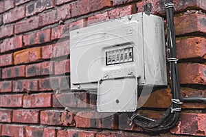 The old broken electrical panel or box of the drawer on the wall. Industrial Abandoned Power Control