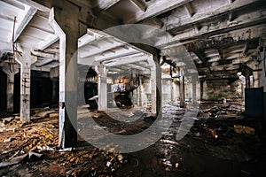 Old broken empty abandoned industrial building interior