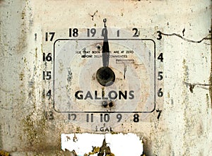 Old broken gas or petrol station dial