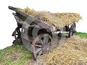 old broken horse cart with straw