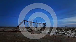 Old broken jetty during blue hour