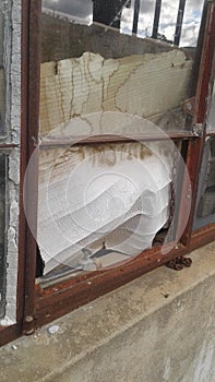 Old broken packhouse window photo