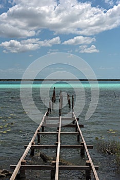 Old broken pier at the lagoon of Bacalar, Quintana Roo, Mexico