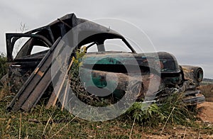 Old broken rusty car