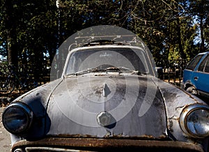 Old broken rusty car