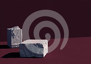 Old broken stone brick on burgundy background. 3d computer graphic template of displaying place for your products