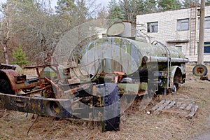 An old broken tank truck in the Chernobyl radiation contamination zone