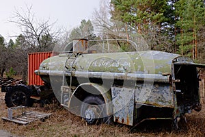 An old broken tank truck in the Chernobyl radiation contamination zone