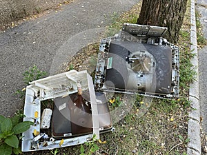 Old broken televisions on the street