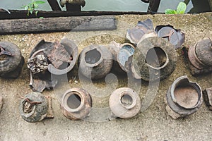Old broken Thai antique clay pot