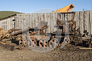 Old broken tractor is standing in the village