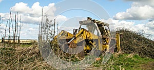 Old broken vintage yellow farm jcb digger