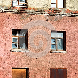 Old broken windows in the house close-up