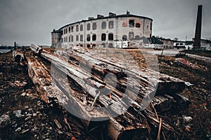 Old broken wood batten on the ground near Abandoned Patarei prison In Tallinn, Estonia. MÃÂ¤lestusmÃÂ¤rk deporteeritutele