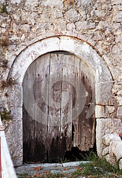 The old broken wooden door