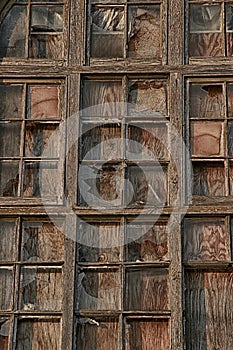 Old broken wooden window panes with glass