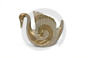 Old bronze candlestick in shape Swan isolated on a white background